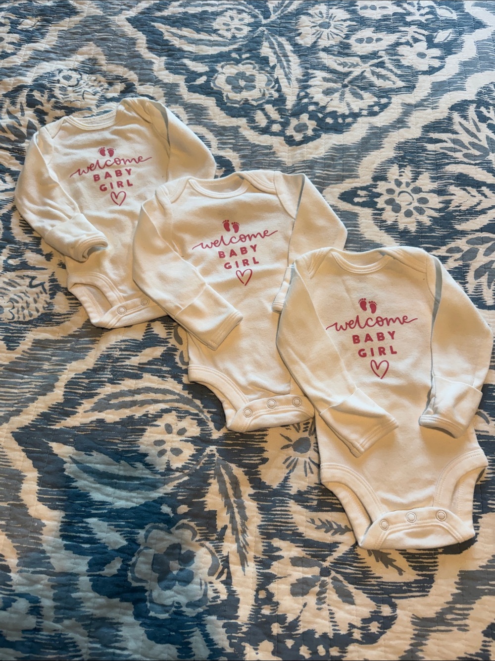 White Long-Sleeve Baby One-Piece with Pink 'Welcome Baby Girl' Graphic